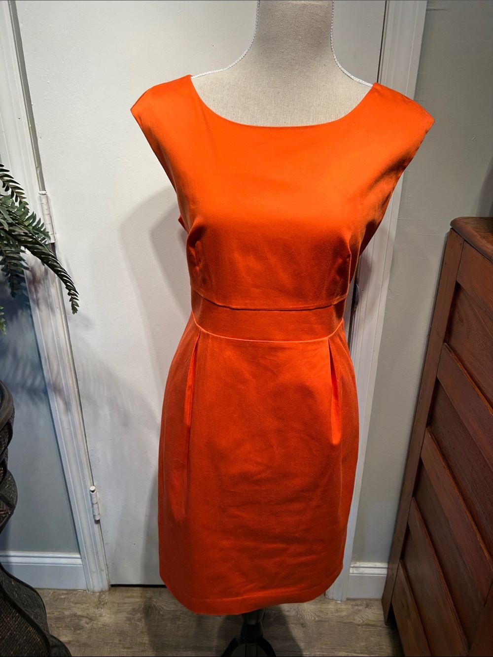 Michael Kors Sleeveless Orange Sheath Dress with accented waist Logo Button Back